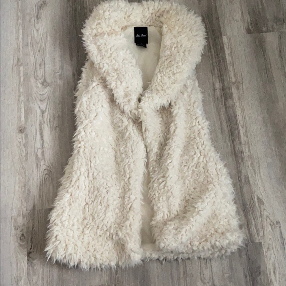 Faux fur vest. Very warm and soft.